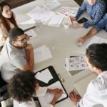 Team of creative professionals meeting in conference room