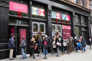 Shoppers line up outside of the QVC Holiday House pop-up.
